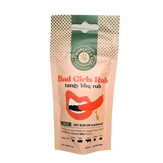 Delicious BBQ ribs being grilled to perfection on an outdoor barbecue. The meat is beautifully charred and covered in a flavorful sauce. A plume of mouthwatering smoke rises from the grill. Perfect BBQ for a summer gathering.