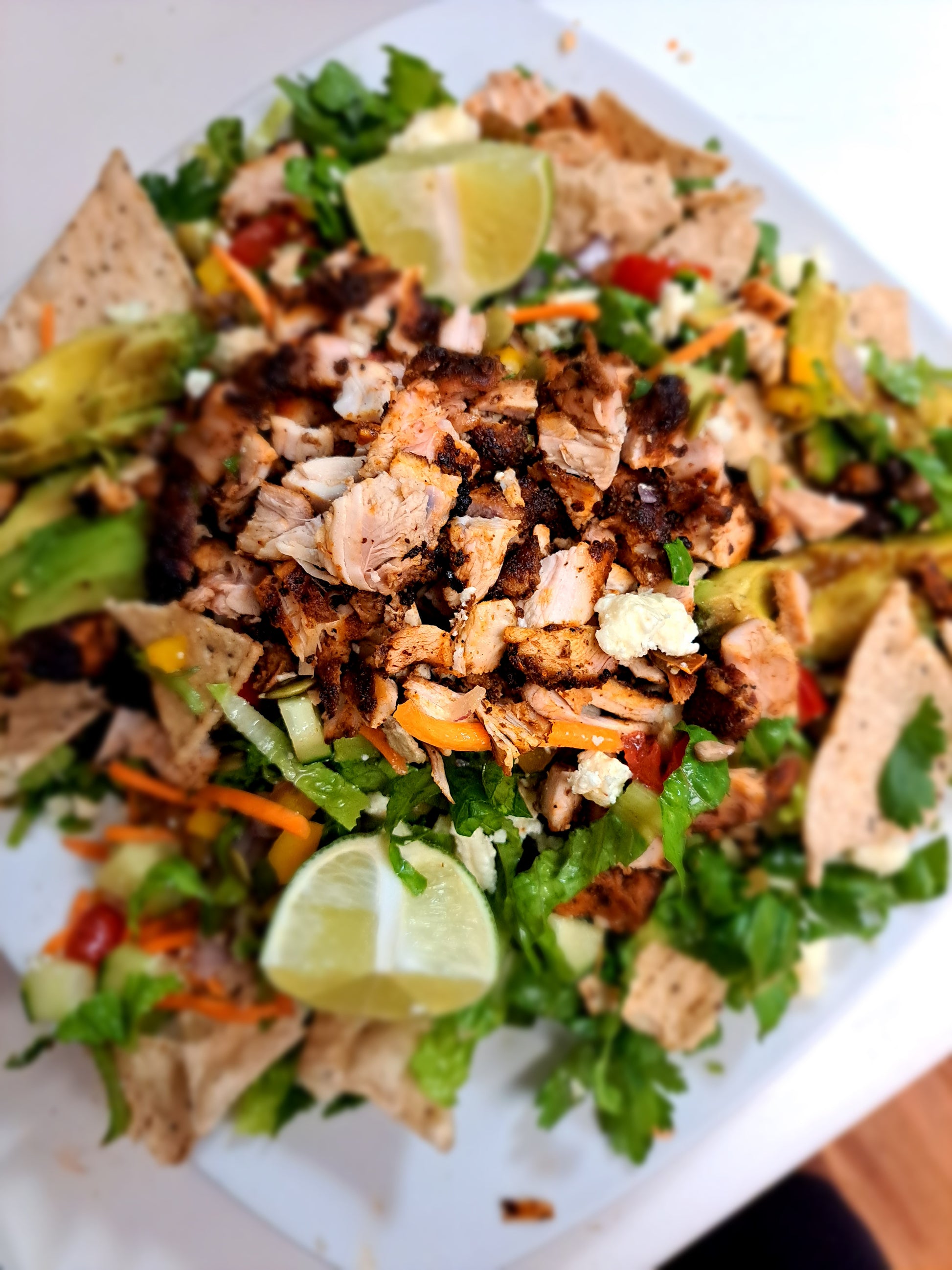 Grilled molé rubbed chicken taco salad